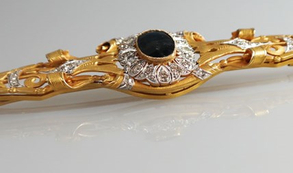 Gouden Art Nouveau broche met diamant