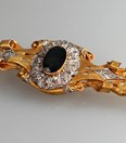 Gouden Art Nouveau broche met diamant