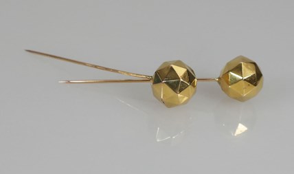 Antieke gouden facetspelden