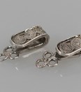Antieke zilveren keelbandhaakjes streekdracht Marken