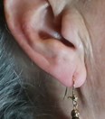 Antieke gouden oorbellen met haar