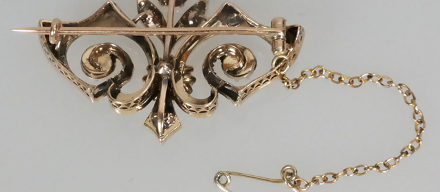 Antieke gouden broche met diamant