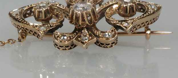 Antieke gouden broche met diamant
