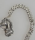 Antieke zilveren horlogeketting met paardje