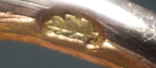 Antieke zilveren oorijzer met gouden krullen streekdracht Zeeland Axel