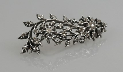 Antieke veerbroche met diamant