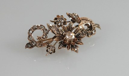 Antieke gouden broche met diamant