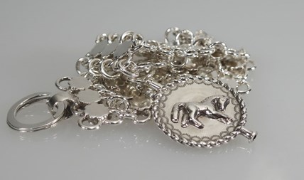 Antieke zilveren horlogeketting met sleutel