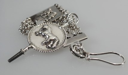 Antieke zilveren horlogeketting met sleutel