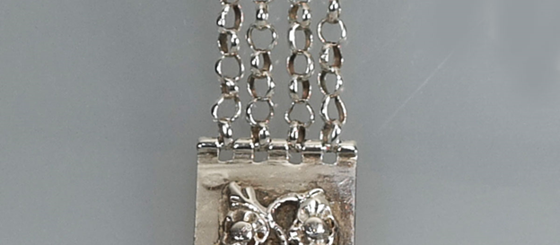 Antieke zilveren horlogeketting met sleutel