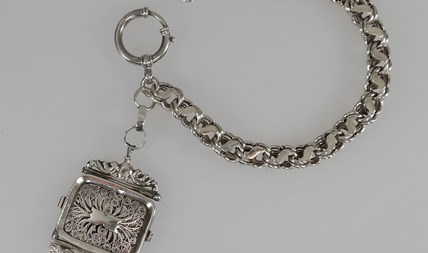 Antieke zilveren horlogeketting met sleutel